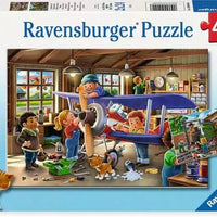 Puzzle Ravensburger - Reparación de Aviones y Trenes. 2x24 piezas